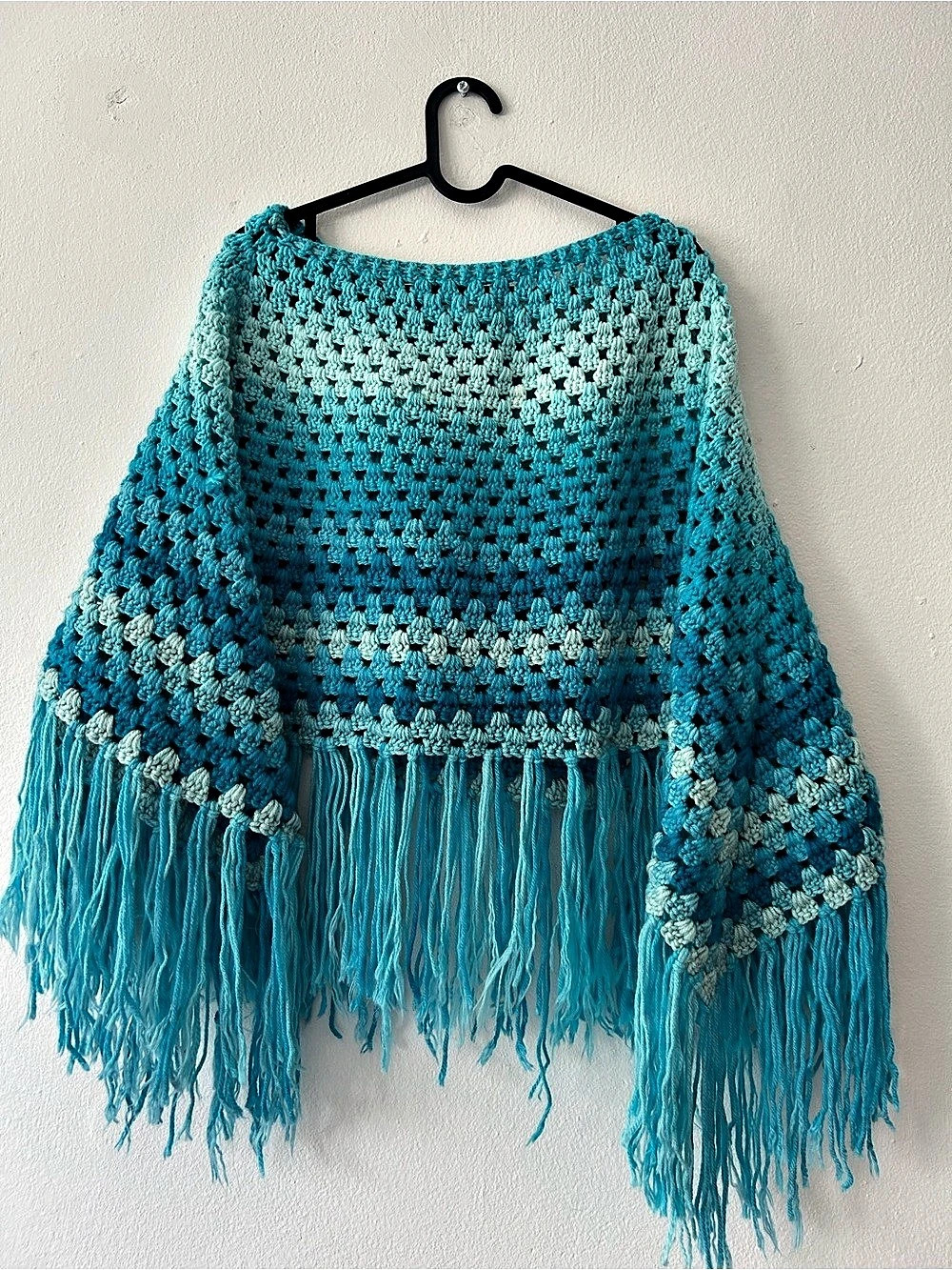 Handmade turquoise blue crochet poncho